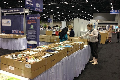 In a back corner of the show floor at Windpower 2015, attendees filled small plastic bags with hygiene products that have been collected and recycled by Clean the World. The nonprofit will distribute the bags to organizations that serve the needy in the United States and abroad.