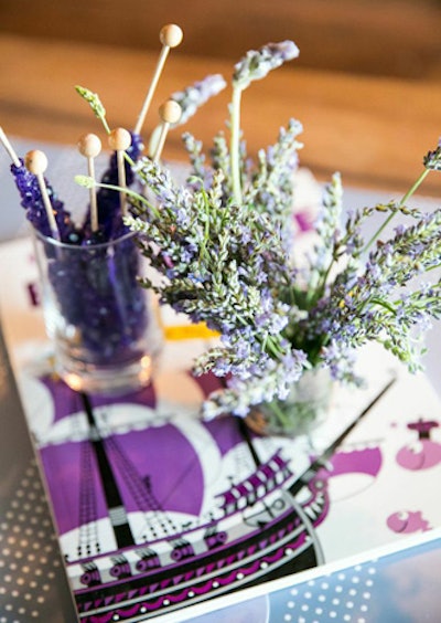 Rock Paper Scissors Events designed a shower with a “lavender” theme that included purple candies and lavender in the floral arrangements by Cristina Lozito. Because showers are usually held during the day, planners like to use a light, cheerful color to design a cohesive look.