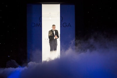The M.C. of the night, Lily Koppel, author of The Astronaut Wives Club, welcomed Omega ambassador George Clooney to the stage, calling him the “man on the moon.” The actor, who emerged from a cloud of white smoke and waxed poetic on the Apollo 13 mission, shared the stage with Omega president Stephen Urquhart and astronauts Gene Cernan, Captain Jim Lovell, and General Thomas Stafford.