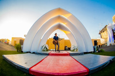 At an on-site wedding chapel, a stage-like setup covered by three white arches, attendees can officially tie the knot. The festival expects to perform as many as 20 wedding ceremonies over the two weekends.