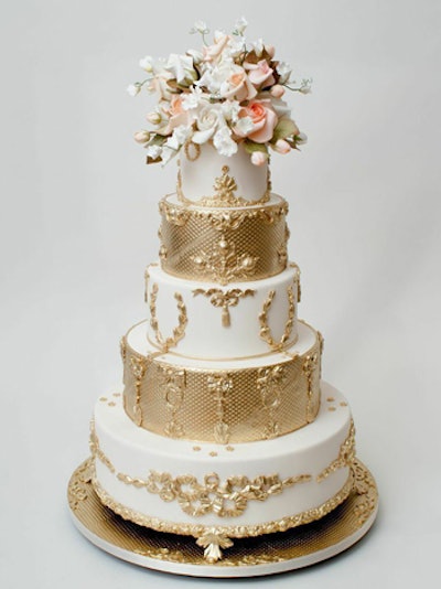 Wedding cakes are being lavished with gilded touches. Ron Ben-Israel Cakes in New York creates confections tinged with lace patterns and metallic hues.