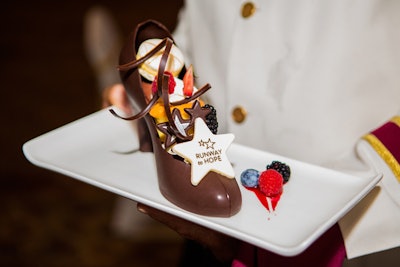 Pastry chefs at the Rosen Shingle Creek created a fitting dessert for a fashion show—milk chocolate shoes filled with fresh fruit and macarons.