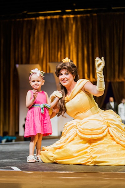 Disney characters such as Belle and other local and national celebrities escorted the pediatric cancer patients and survivors down the runway.