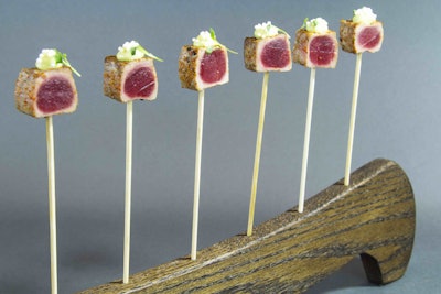 Lollipops can be sweet or savory like the seared tuna version with togarashi, avocado mousse, arare, and micro shiso from Paramount Catering and Events.