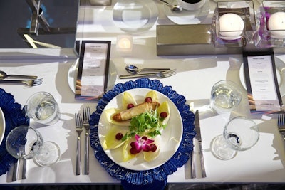 Served with jagged-edged blue charger plates, the first course was an endive salad with a crostini of maple-smoked cheddar and raspberry vinaigrette.