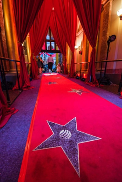 Chicka Chicka Boom Boom set up a red carpet entrance to the museum with flash lighting from Nomad Event Systems to mimic paparazzi camera flashes.