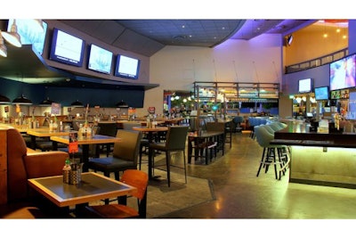 The Sports Deck features high top and booth seating a large bar and numerous flatscreens