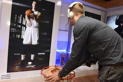 Brooklyn Nets star Mason Plumlee manipulated his own image in a game that American Express devised for fans in town for the N.B.A. All-Star Game that let them control images of the player using a basketball-shaped console.