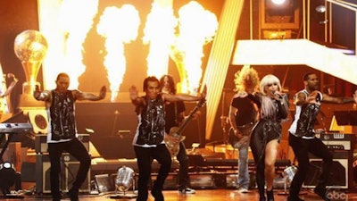 Lady Gaga gets bursts of flames by TLC Creative heating up a television performance.