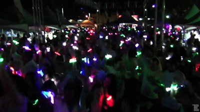 TLC Creative and Xylobands LED wristbands with live control at a festival event.