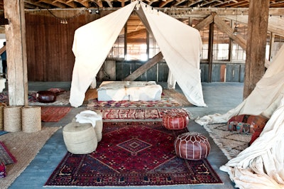 Cabana Poufs Ottomans and Persian Rug at PioneerWorks