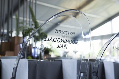 Sponsor names appeared on the back of ghost chairs at each sponsor's table.