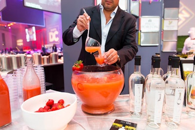 A food pavilion sponsored by the Embassy of Peru served a strawberry ginger cocktail mixed with Pisco 100, a Peruvian liquor.