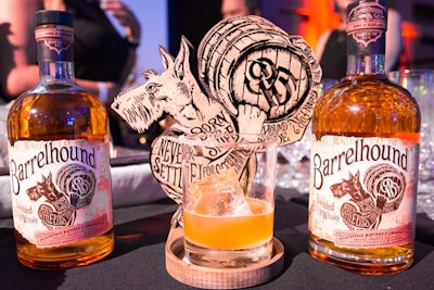 Liquor sponsor Barrelhound, a blend between scotch and whiskey, created a summer cocktail mixing its spirit with Campari, grapefruit juice, and grapefruit cordial served with a single ice cube.
