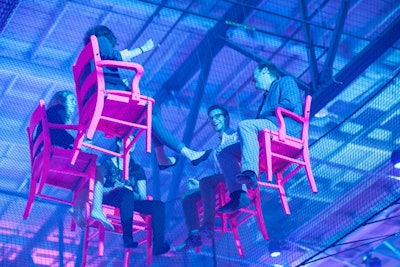 A moderator led guests in a seven-minute discussion of business topics while they sat in chairs suspended inside a net 18 feet in the air. “When you are physically at risk of something, your perception of who you are, the environment, the world, will change. So that’s what we wanted to accomplish,” St-Pierre said.