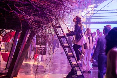 C:Lab, the creative laboratory of Cirque du Soleil, used real tree branches to create the Nest, a hollow structure measuring 30 feet across and sitting 10 feet in the air. Participants were invited to climb a ladder into the nest where a moderator led them in a discussion. To leave the nest, attendees slid down a slide.