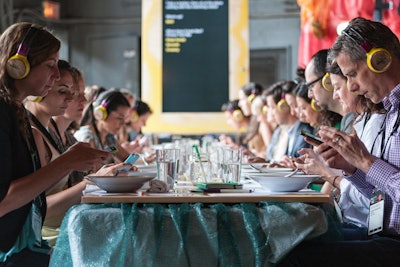 During the “In the Mouth” food events, participants received information and instructions throughout the meal via headphones.