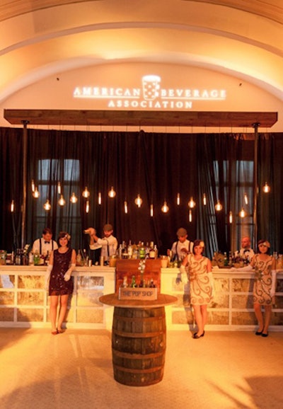 The American Beverage Association sponsored the Publisher's Reception, where Chicka Chicka Boom Boom created a speakeasy environment with dim lighting, black-and-white movies projected onto the wall, and servers from Occasions Caterers dressed as flappers.