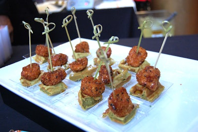 Ping Pong Dim Sum served green-tea waffles topped with sesame fried chicken and drizzled with lemongrass maple syrup.