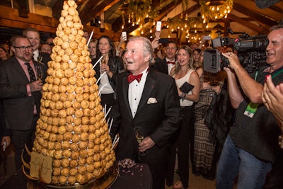Renowned chef Jacques Pépin will celebrate his 80th birthday later this year. Organizers hosted a celebration during the festival and presented him with a croquembouche—a French dessert consisting of a tower of choux pastry balls held together with caramelized sugar.