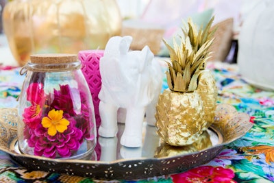 There were also mirrored trays holding homey props such as candles, golden pineapples, and elephant figurines. Some of the goods on display were from Sparkle and Shine Darling, a store and event space in Miami Beach that Bosh will open soon.