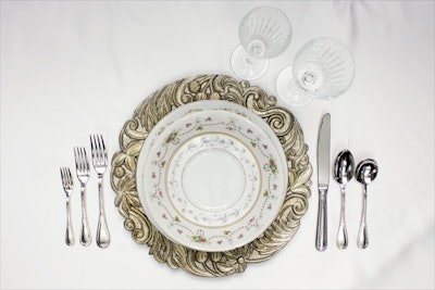 Aristocrat silver charger; Timeless wine and champagne glasses; Savoy silver flatware, prices upon request, available in the mid-Atlantic region from All Occasions Party Rental. Vintage china dinner plate, $22.50 for a set of 10; salad and bread and butter plates, $17.50 for a set of 10, available throughout the East Coast from New England Country Rentals.