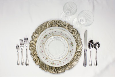 Aristocrat silver charger; Timeless wine and champagne glasses; Savoy silver flatware, prices upon request, available in the mid-Atlantic region from All Occasions Party Rental. Vintage china dinner plate, $22.50 for a set of 10; salad and bread and butter plates, $17.50 for a set of 10, available throughout the East Coast from New England Country Rentals.