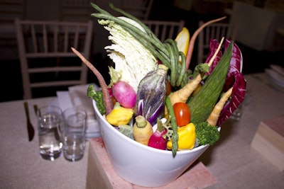 Bowls of bright crudites including spring asparagus, baby carrots, and radishes provided vibrant pops of color against the neutral decor palette.