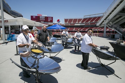 Chef José Andrés participated in a panel that discussed methods of environmentally friendly cooking, including using solar-powered stoves.