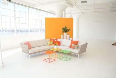 Modern neutrals like the outdoor Bamboo collection get a pop of color with bright accent pillows.