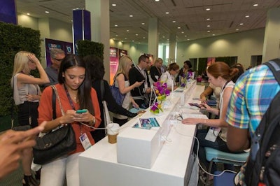 Guests prepared for the day by powering up their phones at charging stations in the registration lounge, provided by Blueprint Studios.