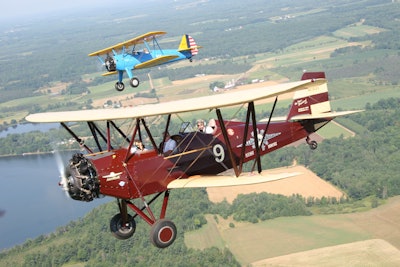 Vintage Bi-plane Rides Taking Off From Private Runway