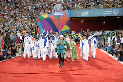 Stilt walkers and other entertainers led the way for the Parade of Athletes, representing a record-breaking 165 countries.