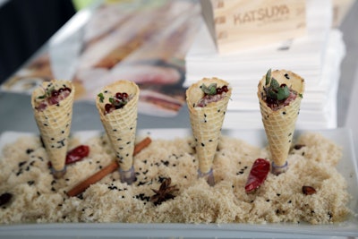 As part of the the South Beach Wine & Food Festival in 2014, the Celebrity Chef Golf Tournament offered mini cones served in a presentation meant to evoke a sand trap. Chef José Andrés hosted the event, and his restaurant Katsuya provided the food.