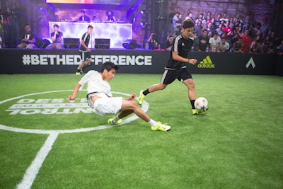 Elite soccer club players showed off Adidas's latest cleats on a field the brand built within an arts district warehouse.