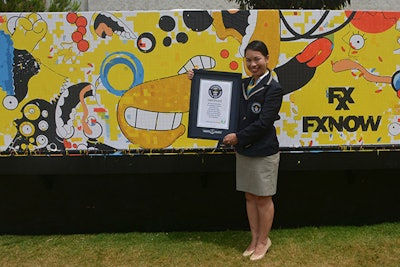 At Comic-Con International in San Diego in 2014, FXX Networks achieved the most contributions to a painting-by-numbers, with 2,263 people helping to create a mural representing the animated series The Simpsons. The canvas held 5,565 paintable squares.