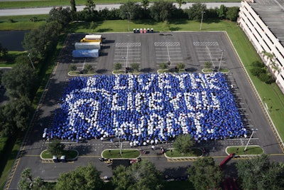 An umbrella mosaic set a world record for the National Federation of the Blind. The organization staged the event at its annual conference in Orlando July 8. The event included 2,480 people simultaneously raising umbrellas to create the image of the organization’s logo and tagline, “Live the life you want.”