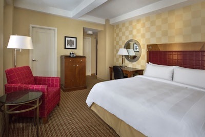 Spread out and kick your feet up in our king guest rooms