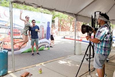 A photo activation captured guests jumping in front of a backdrop that featured iconic Chicago images, such as deep-dish pizza and Wrigley Field.