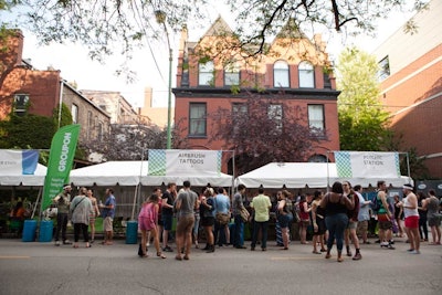 The outing took over a section of Chicago's Lincoln Park neighborhood the day before it opened for a public festival. The event kicked off at 4 p.m. on a Friday, and a private bus transported guests from Groupon's headquarters.