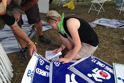 Everyone’s Invited team members sorted through accessibility signs after the Bonnaroo Music & Arts Festival.