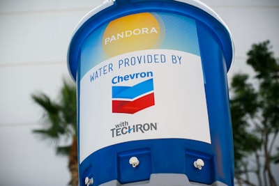 Guests were able to fill up at the watering station or from one of the co-branded water towers brought in due to the weekend's scorching 100-degree weather.