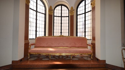 Historic pink bench in the Salon Chapelle