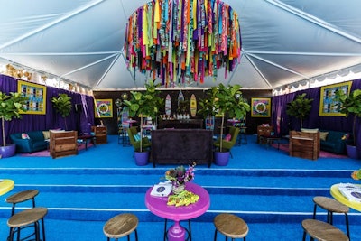 A three-tier chandelier made from 200 yards of fabric hung as the centerpiece in this year's Teen Choice Awards V.I.P. tent.