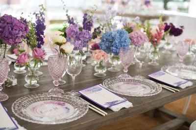 An artfully displayed watercolor-palette tablescape.