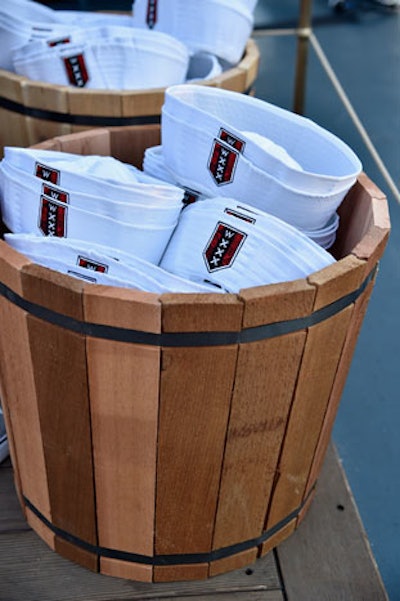 Buckets held extra branded caps for guests.