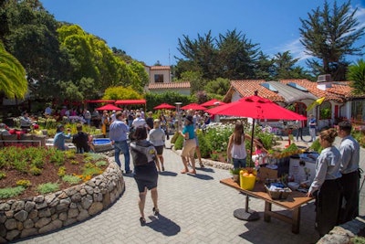 The private portion of Casa Ferrari featured a full takeover of an existing art gallery space, which the auto brand relandscaped and decorated with red awnings and umbrella stands to reinforce its iconic color. Invited guests were at liberty to enjoy all the trappings at no cost.