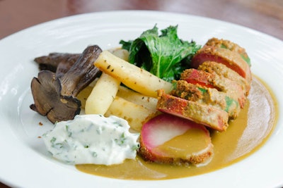 Lobster mushroom-crusted, beet-marinated potato and grilled zucchini, served with bluefoot mushrooms, grilled kale, roasted salsify, and chive cream, by Blossom in New York