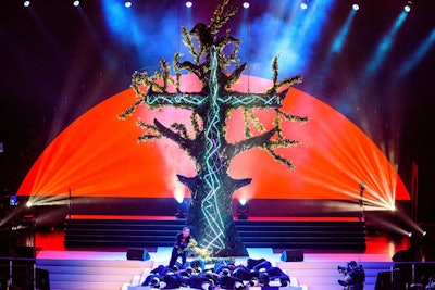 A 30-foot-tall scenic LED tree set piece accommodated six modern dancers climbing, sitting, and performing on it.