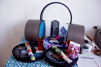 MoDMade's basket was shaped like a pair of giant headphones; each end detached to reveal embedded speakers—ideal for outdoor entertaining. Keeping with the theme, the plates resembled vinyl records.